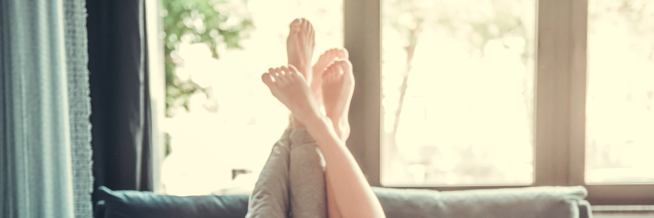 Yes, Autistic People Have Sex Just Like Everyone Else Loving couple with their feet cuddling.