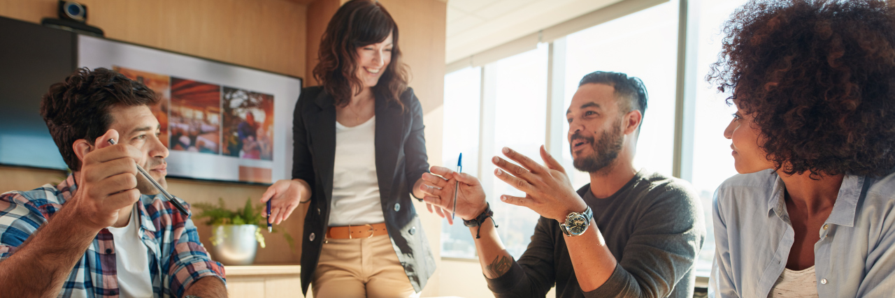 Working With Postural Orthostatic Tachycardia Syndrome Group of co-workers having a meeting.