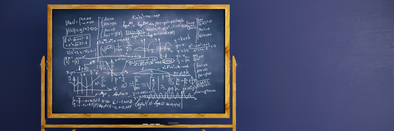 The Math Equations Required to Manage Blood Sugar With Type 1 Diabetes Chalkboard with mathematical formulas placed in interior with blue wall and wooden floor