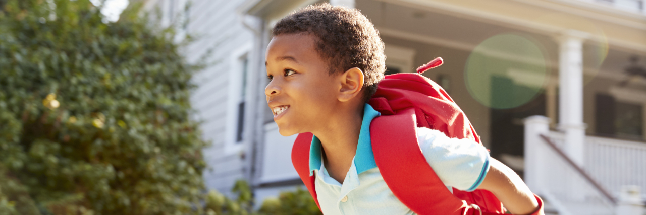 5 Tips for Eliminating Stress: IEP and School Meetings Young Boy with autism Leaving House To Walk To School