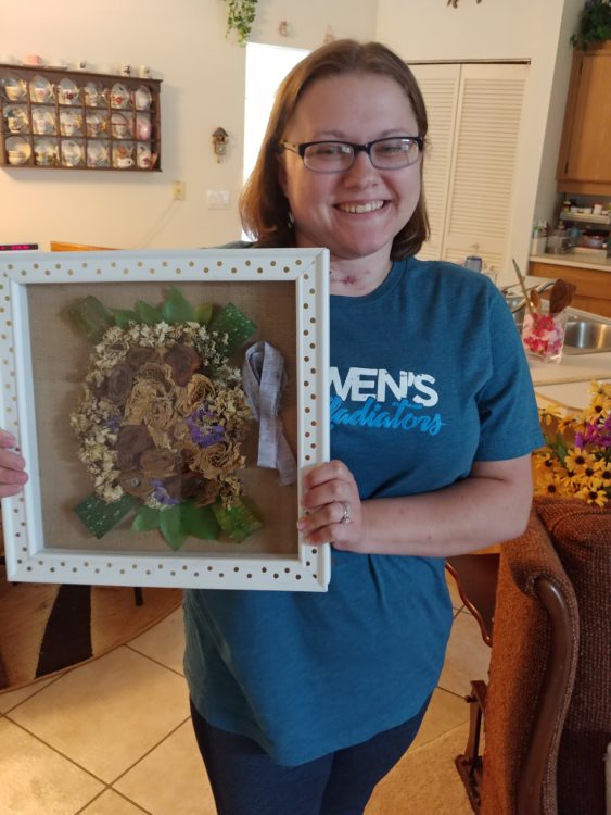 Mighty community member Liz Taylor displays her shadow box preserving her dried flower wedding bouquet