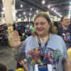 the author wearing an avengers t-shirt at a convention