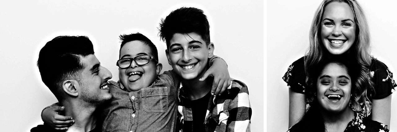 'Who Do You Love' Down Syndrome Photo Series Two black and white images from the photo shoot: One is a boy with Down syndrome hugging two friends or siblings, he is in the middle, all are smiling at camera. Second is a woman with Down syndrome hugged from behind by a friend.