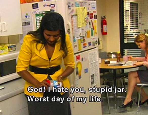 Image of Kelly from "The Office" struggling to open a jar saying, "God! I hate you, stupid jar. Worst day of my life."