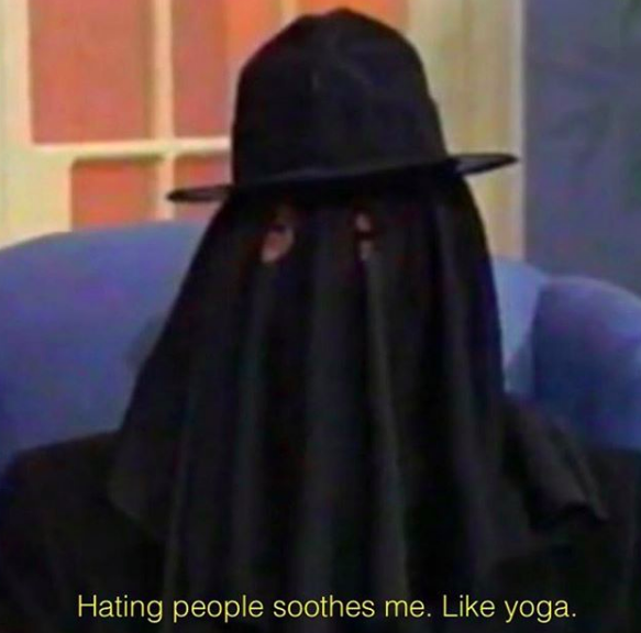 Meme with man with black sheet ghost costume on with the words: "Hating people soothes me. Like yoga."