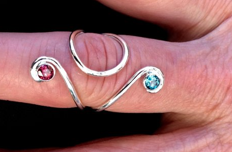 ring splint with pink and blue stones