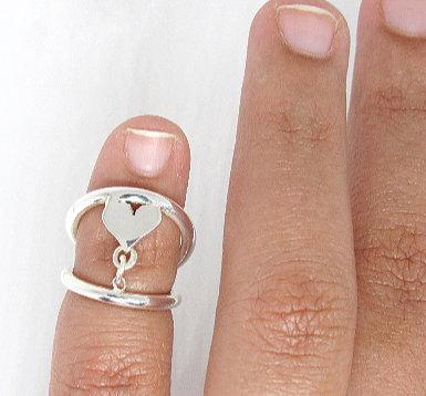 ring splint on pinky with heart design