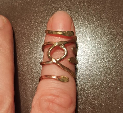 gold ring splint on first finger