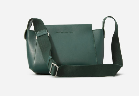 small green purse with long strap