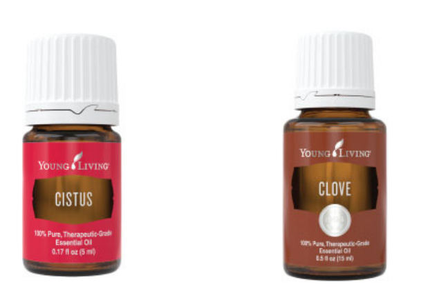 Bottles of citrus and clove essential oils