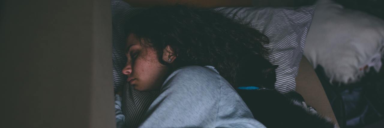 Why Myalgic Encephalomyelitis/Chronic Fatigue Syndrome Is a Blanket woman asleep in bed