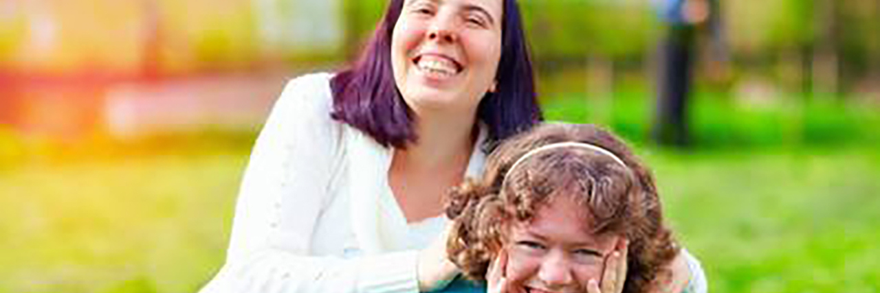 Disability Shouldn't Mean Lowering Your Expectations of a Person Alyssa posing outdoors.