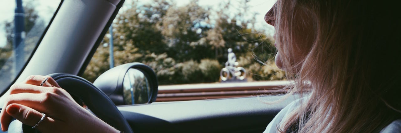 Experiencing Intrusive OCD Thoughts While Driving A woman driving