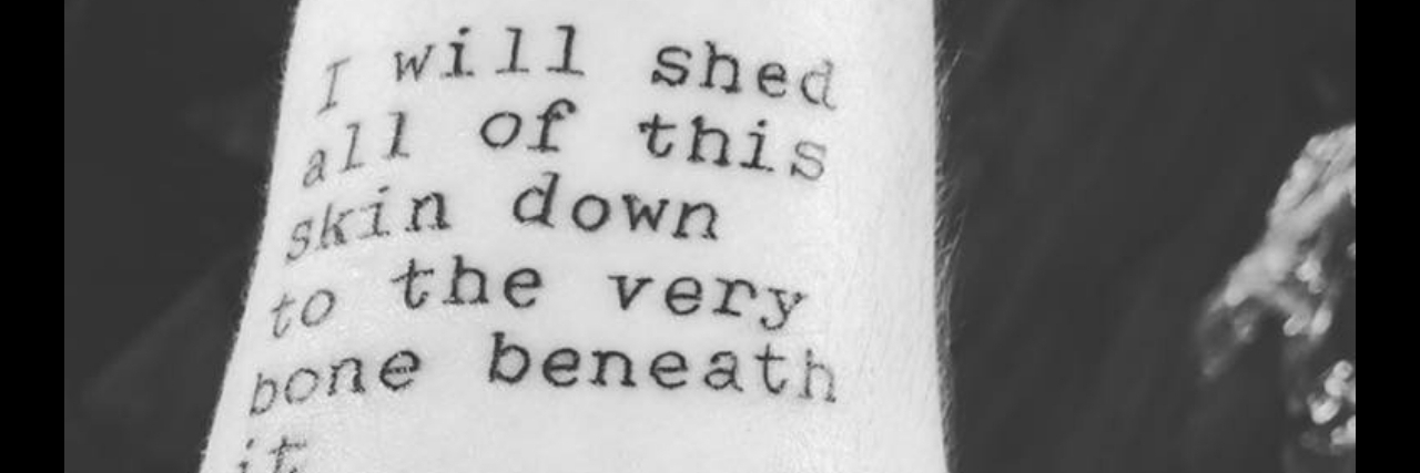 16 Tattoos About Living With Obsessive-Compulsive Disorder (OCD) A tattoo on a woman's forearm. It reads: I will shed all of this skin down to the very bone beneath it if that’s what it will take for you to come to the realization that appearance is not what makes a human beautiful