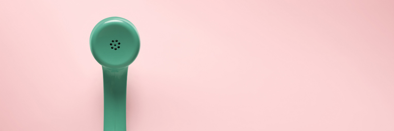 American Association of Suicidology Releases Autism Resource Green telephone with pink background