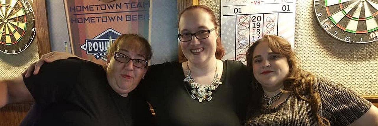 Finding Support and Friendship With Phenylketonuria The author and her two friends smiling