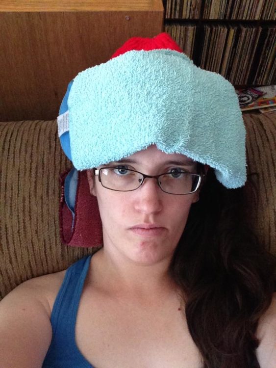 woman with ice pack on her head