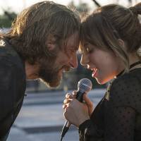 a star is born image showing lead characters singing to each other