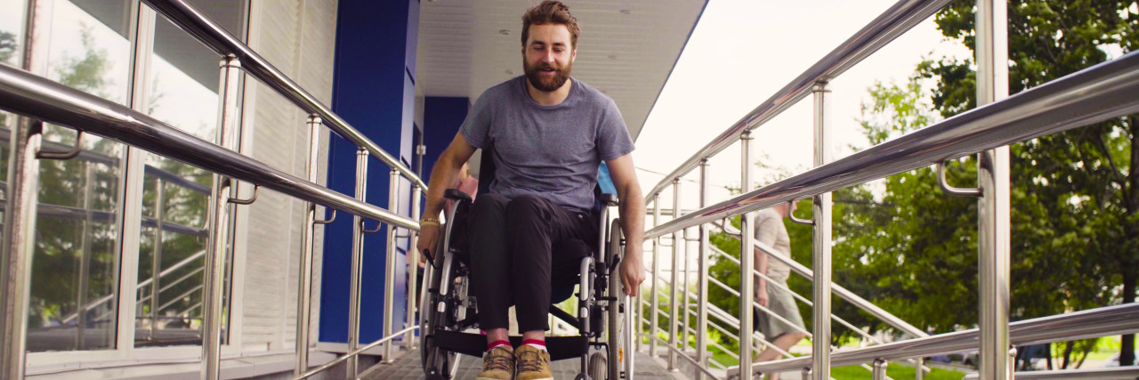 Ambulatory Wheelchair Users Exist Young disabled man in a wheelchair.