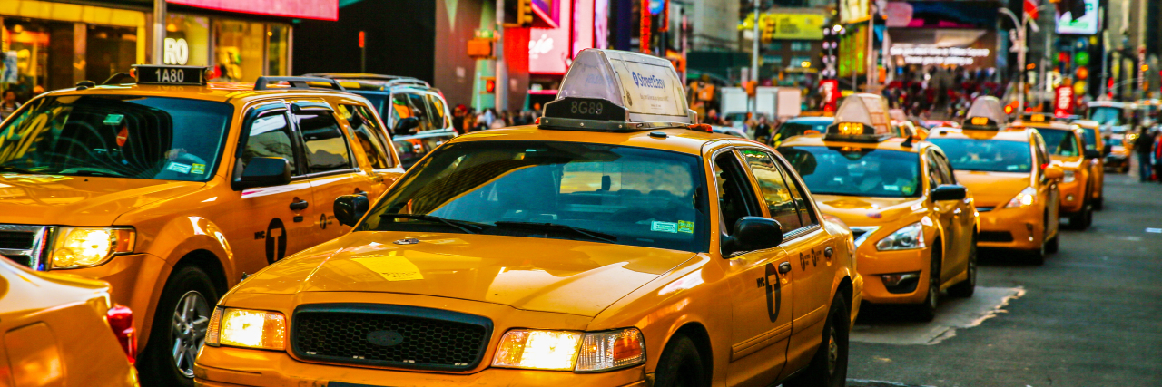 Encountering Wheelchair Accessible Taxi Problems Taxis on 7th Avenue in Times Square, New York City