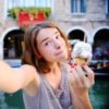 Young woman eating ice cream.