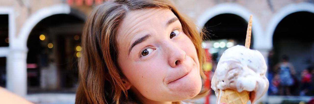 Changing Routines to Help With Surgery Recovery Young woman eating ice cream.