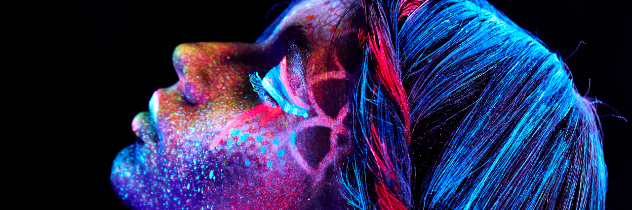 What My Nonverbal Learning Disability Is Not Close up UV portrait of young woman.