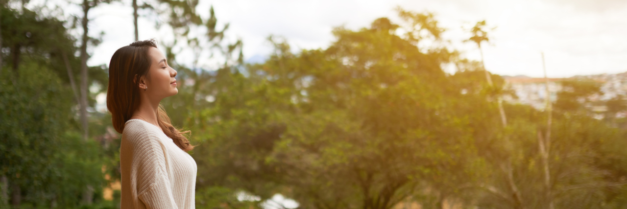 Overcoming Low Expectations in Life With Cerebral Palsy Woman outside breathing fresh air.