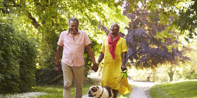How Couples Therapy Is Like an 'Emotional Gym' Senior Couple Walking With Pet Bulldog In Countryside