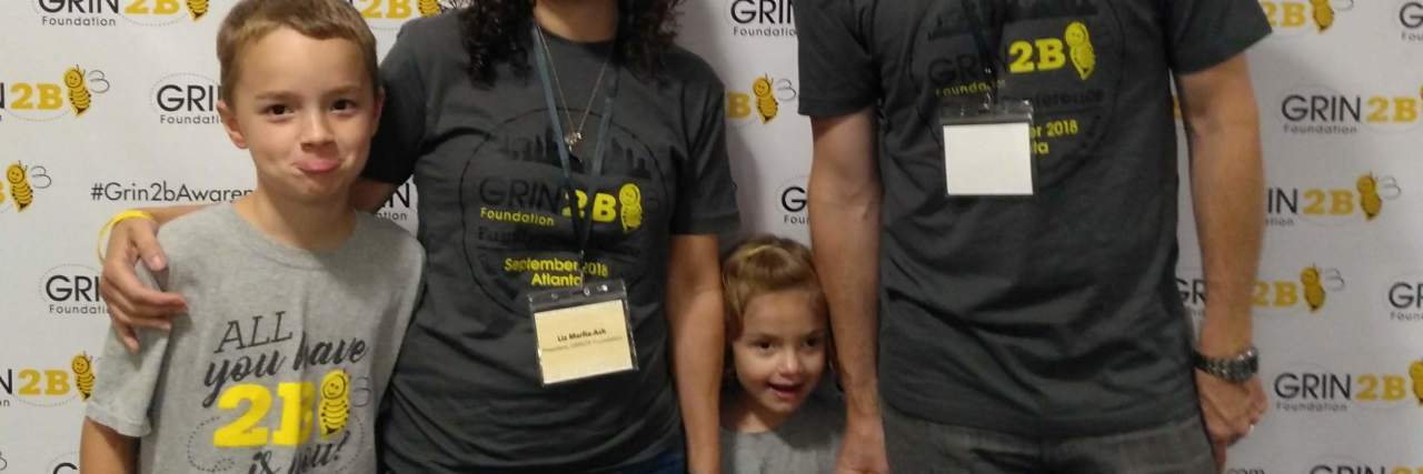 How to Communicate With a Nonverbal Child The author and her family smiling