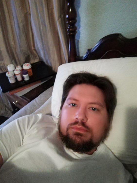 man lying in bed