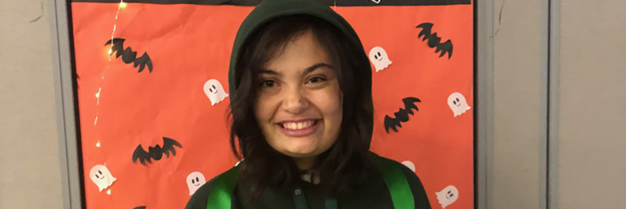 How My Halloween Costume Helped Me Accept My Disabilities I'm wearing my turtle costume at a Halloween event called Scaryokee hosted by Campus Activities Board at my college.