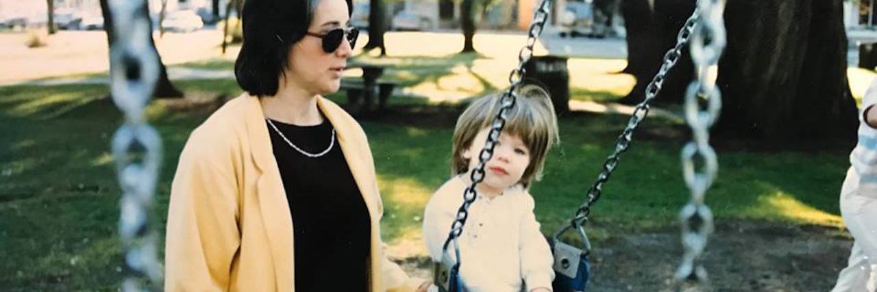 When I Realized My Mother Wasn't Wonder Woman The author as a child and her mother, pushing her on a swing set