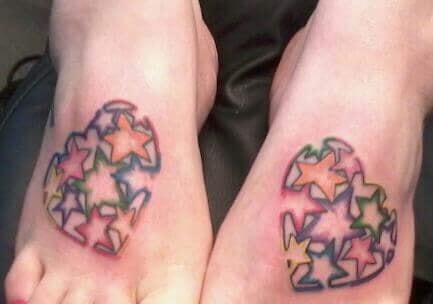 colored heart tattoos on feet