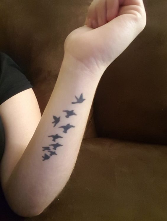 “"Blackbird singing in the dead of night,Take these broken wings and learn to fly." Those lyrics say a lot about how I was feeling and how I wanted to try to use the pain to move forward. My birds were also my first tattoo and a conscious act of reclaiming my body for myself.” — Sarah S.