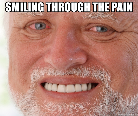 meme of man smiling through the pain
