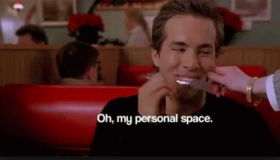ryan reynolds shooing away a woman with a fork and saying "Oh, my personal space"