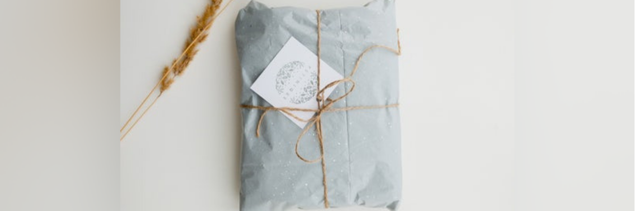 10 Products That Help Me Manage Lupus package wrapped in blue paper with brown string
