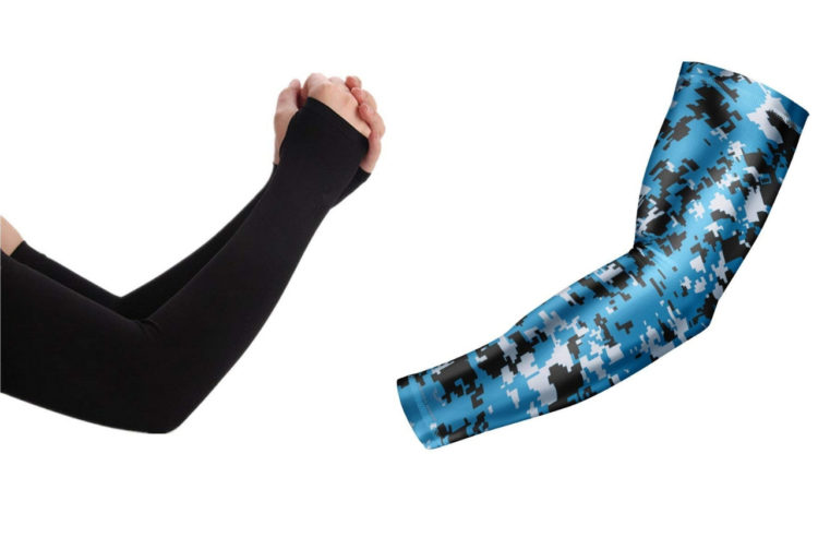 Black compression sleeves with thumb holes and blue patterned compression sleeve
