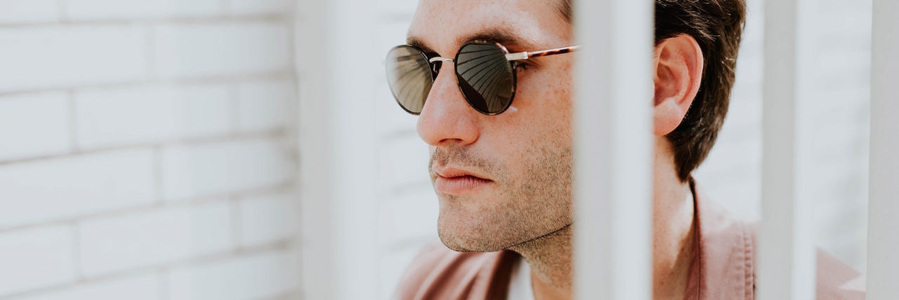 5 'Red Flags' That Might Mean Anxiety Is Controlling Your Life man in sunglasses
