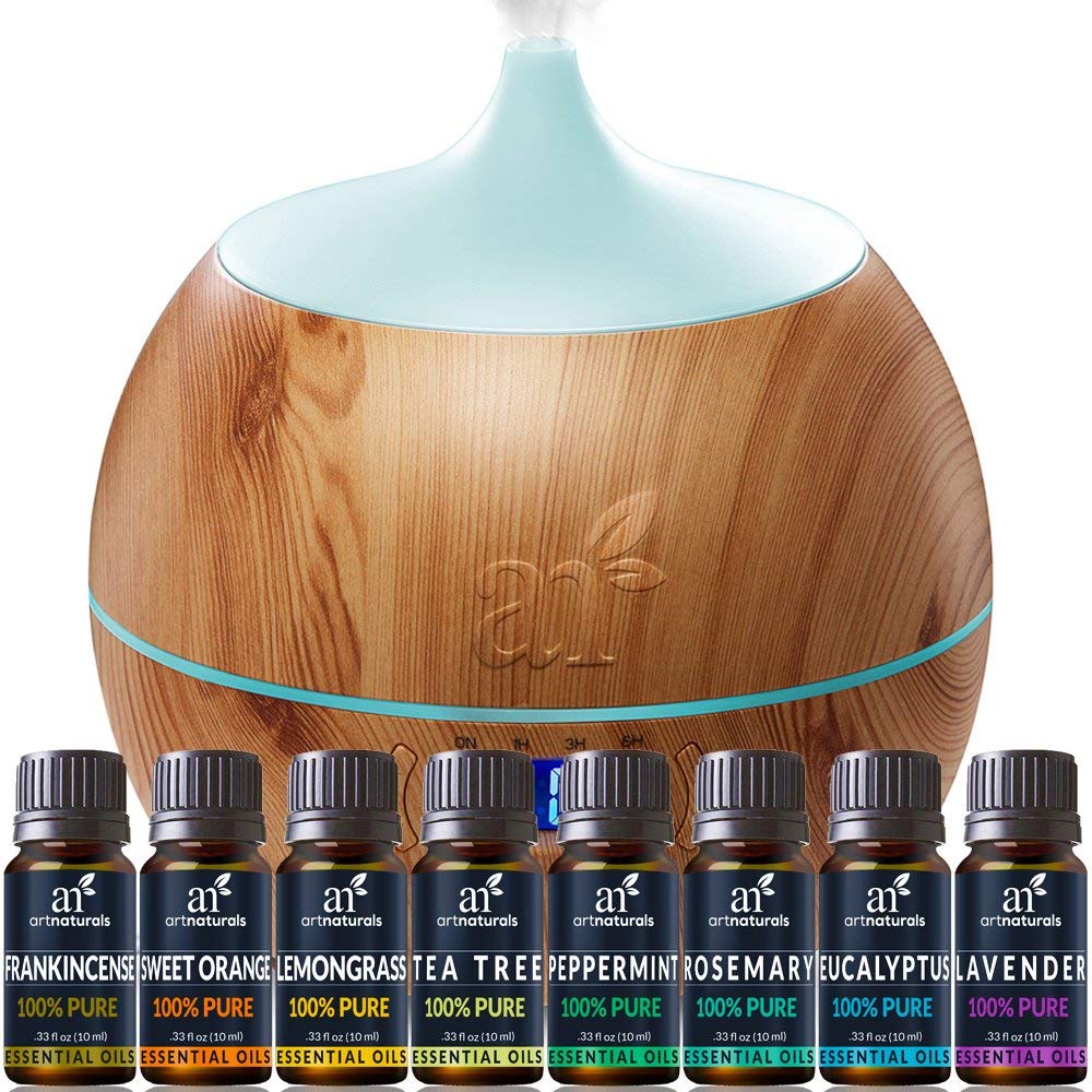 Essential oils and diffuser for autism stress relief.