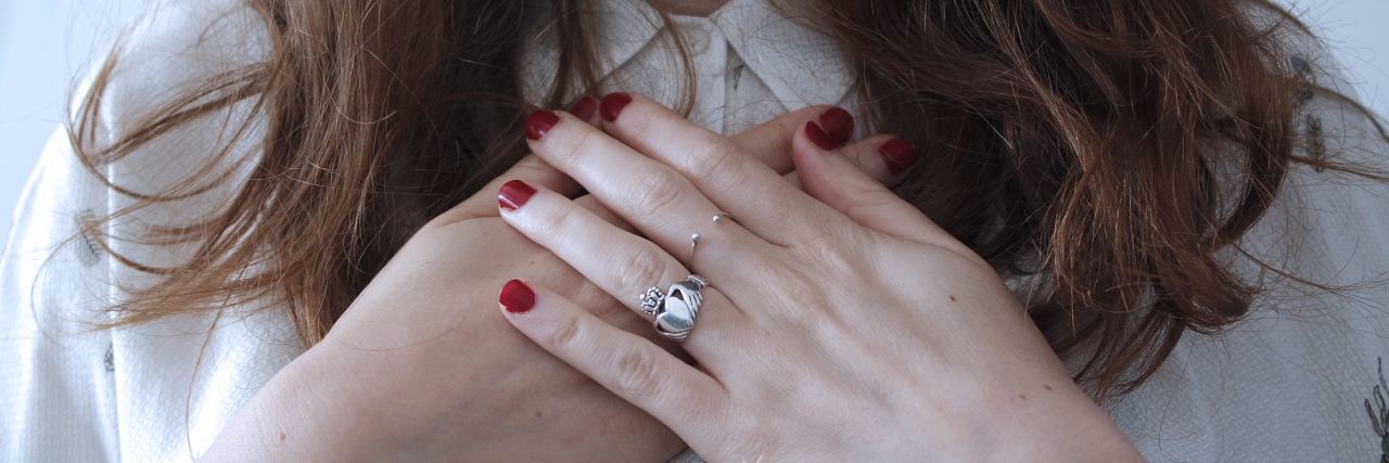Message to Suicidal Patient From a Student Nurse close up view of woman holding hands over heart