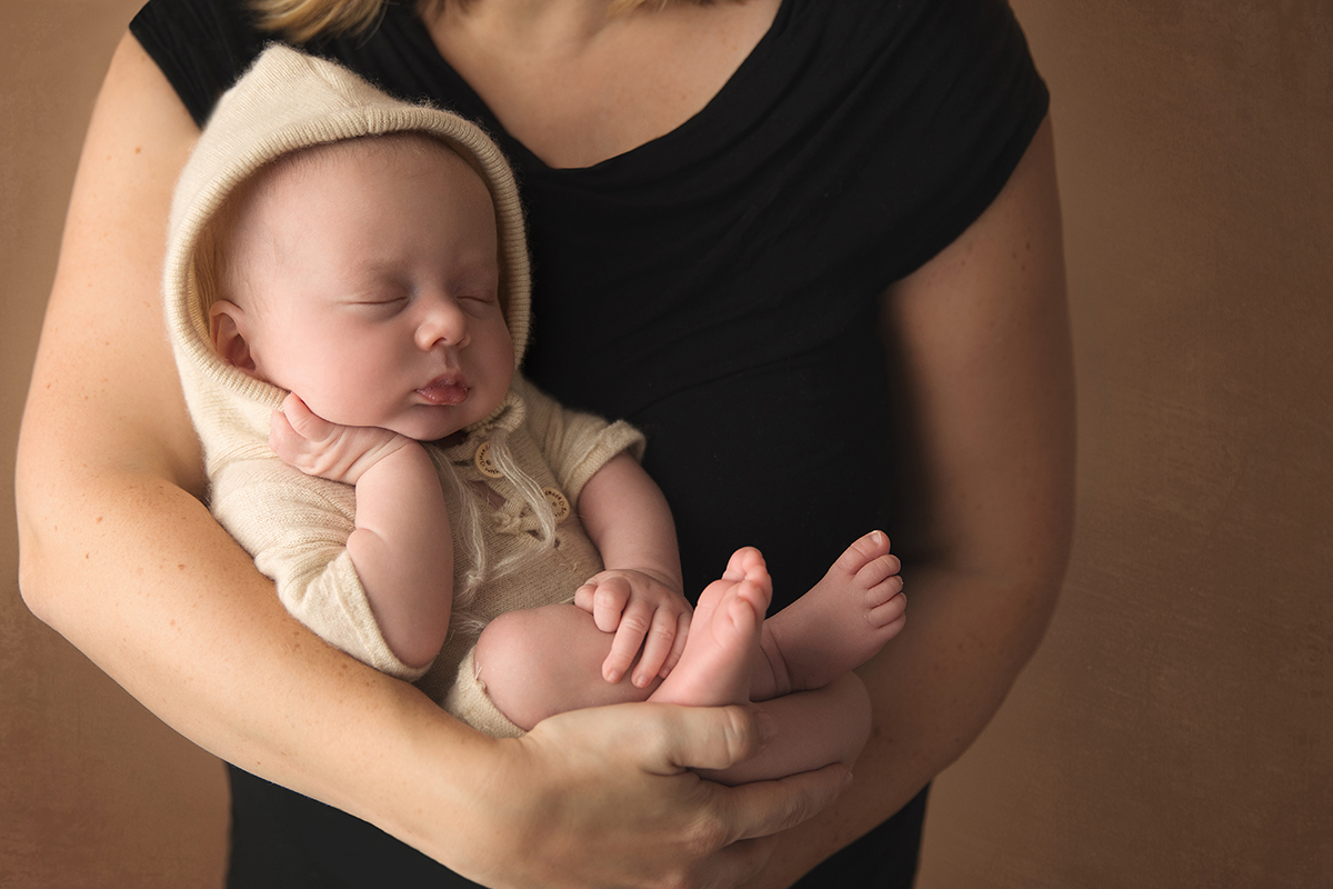 Owen in his mother's arms.