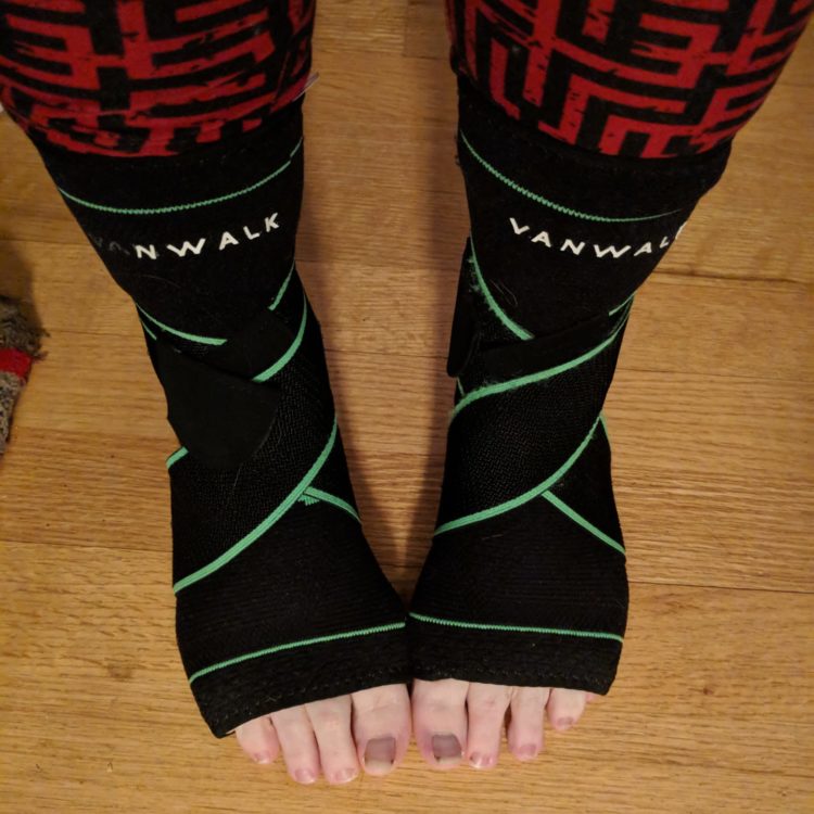 feet wearing ankle braces