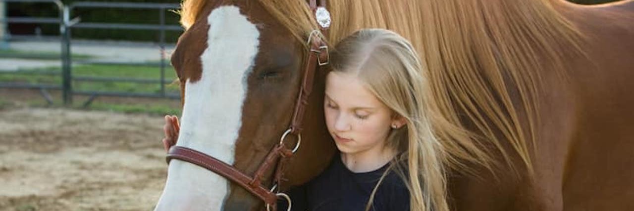Callie and Jazzy the horse.