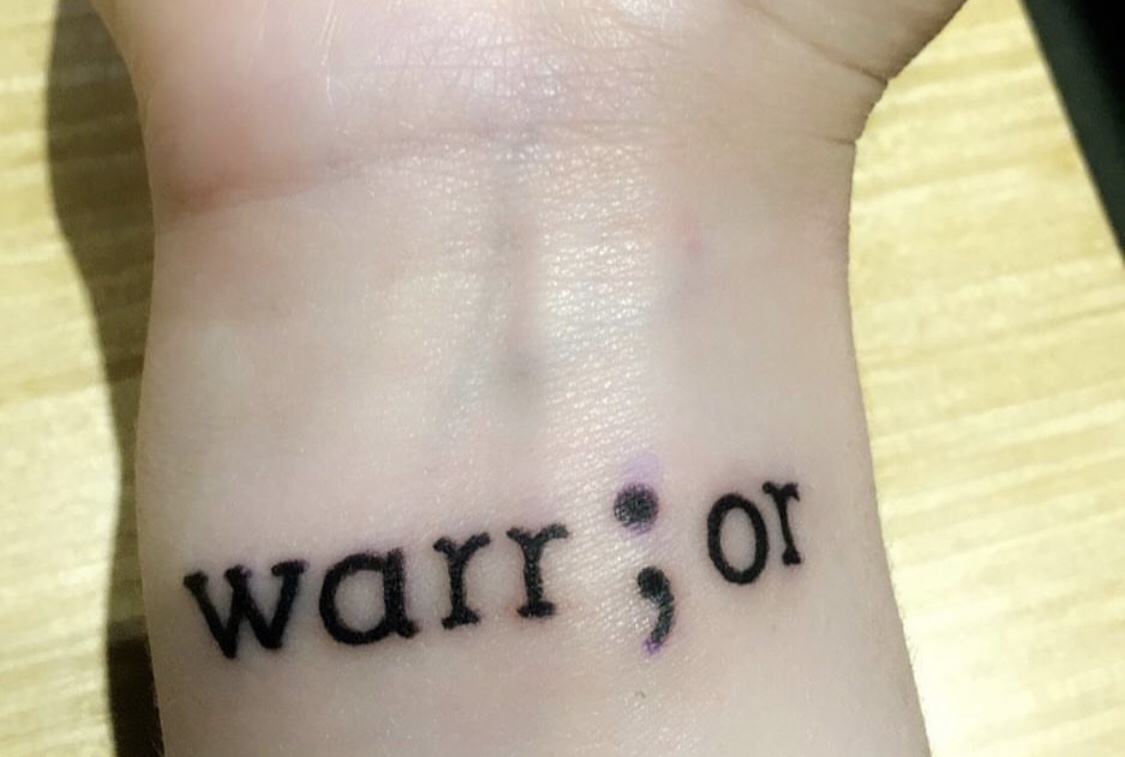 semicolon warrior tattoo on wrist