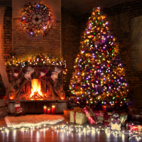 Beautiful living room with fireplace decorated for Christmas.