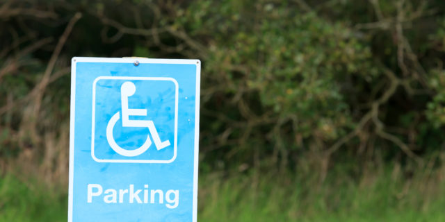 Curbing the Misuse of Accessible Parking Spaces Disabled parking sign.