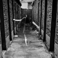 Woman fading into invisibility.