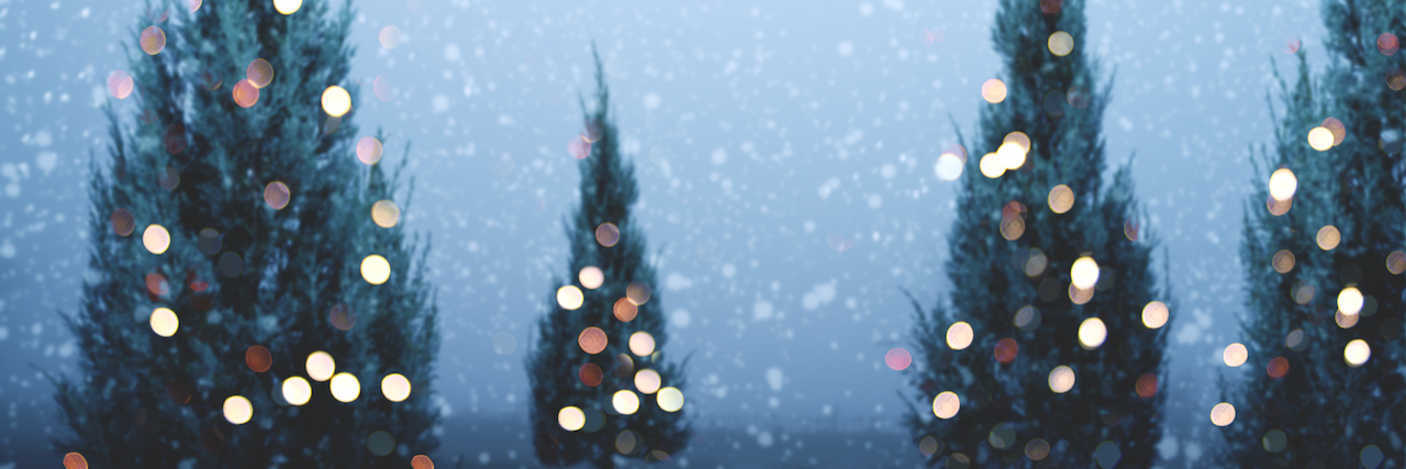 How to Honor a Loved One Who Died by Suicide During the Holidays blurred Christmas tree